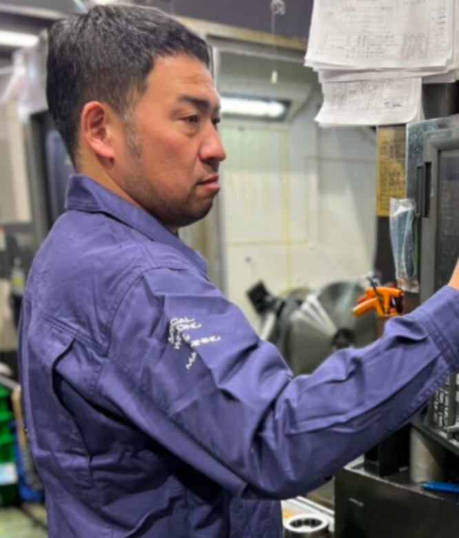 松村 賢司